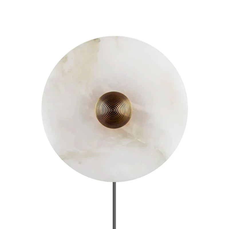Round alabaster plug-in sconce installed dining room - Casa Norex