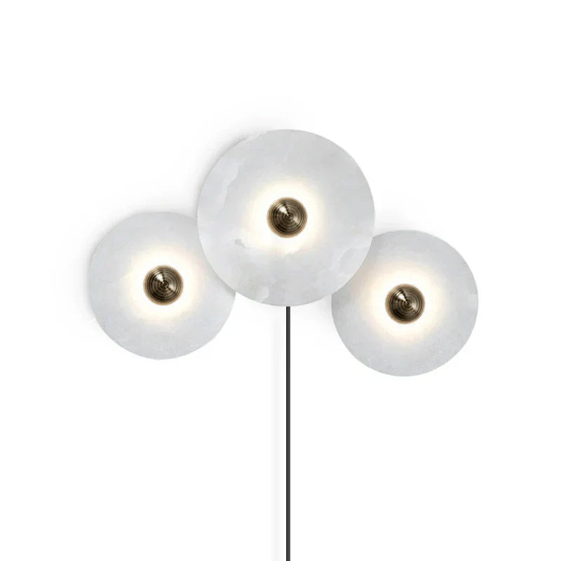 Alabaster combination sconces in modern living room - Casa Norex