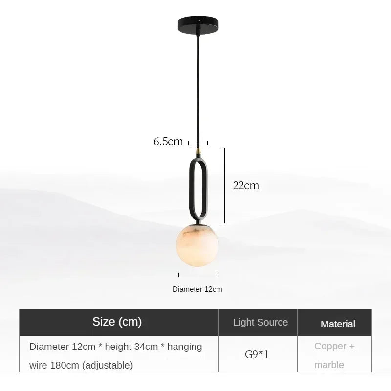 Marble pendant light in dining room setting — warm LED glow | Casa Norex