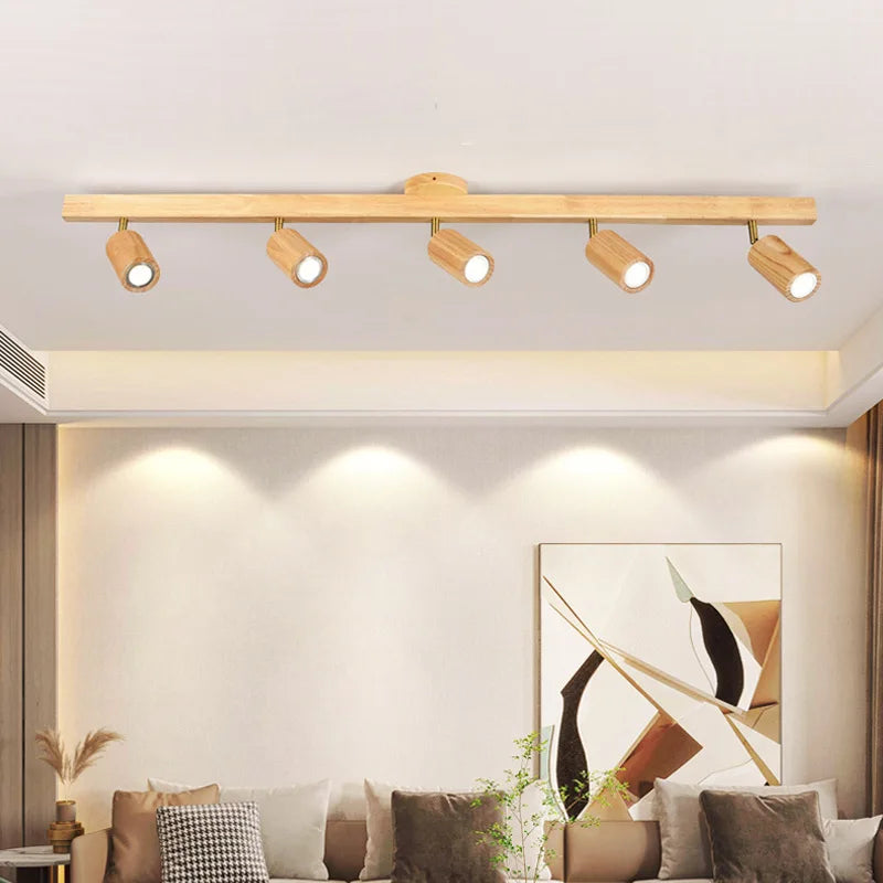 Adjustable wood chandelier in hallway entrance — Casa Norex