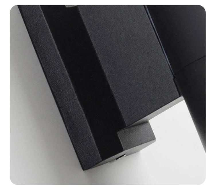 Outdoor wall light round housing close-up on LED lens | Casa Norex