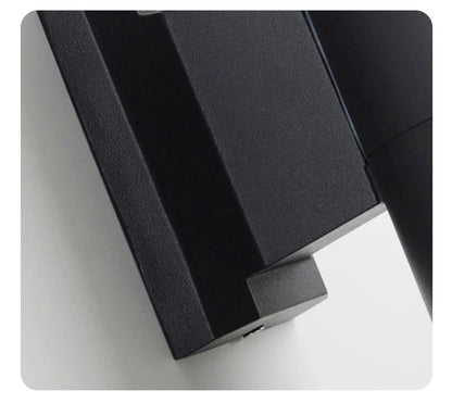 Outdoor wall light round housing close-up on LED lens | Casa Norex
