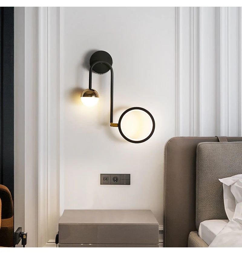Round ball wall sconce wrought iron base plate close-up | Casa Norex