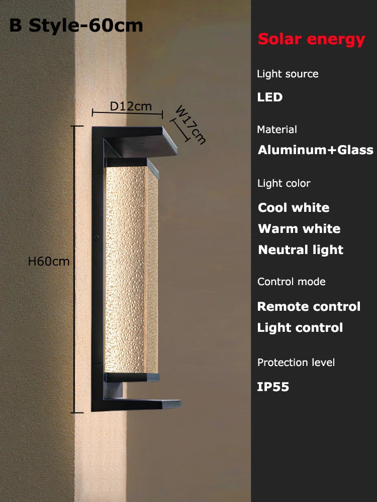 Solar dusk to dawn wall lantern in Black mounted on a wall