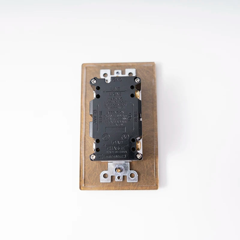 20A wall outlet panel texture close-up — Casa Norex