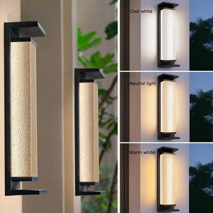 Solar dusk to dawn wall lantern installed beside a garage