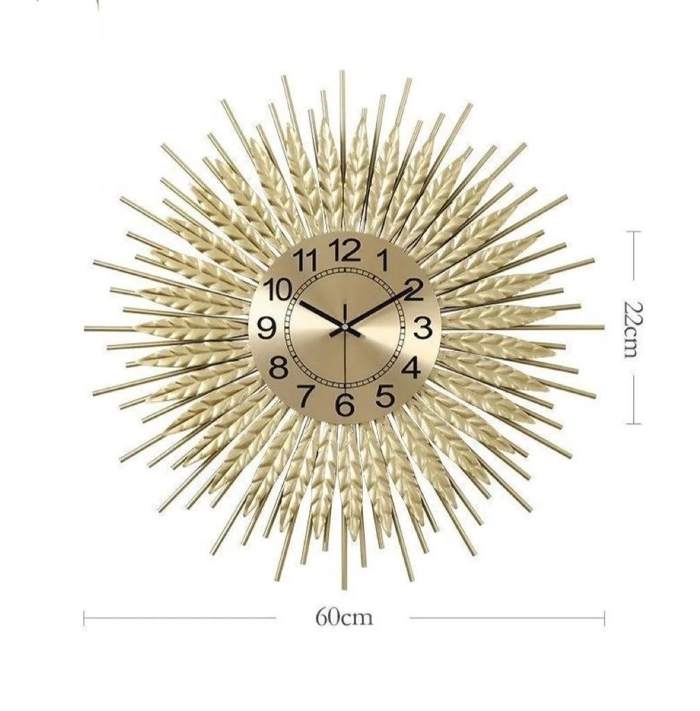 wheat sunburst wall clock — gold iron sunburst frame with wheat-ear motif | Casa Norex