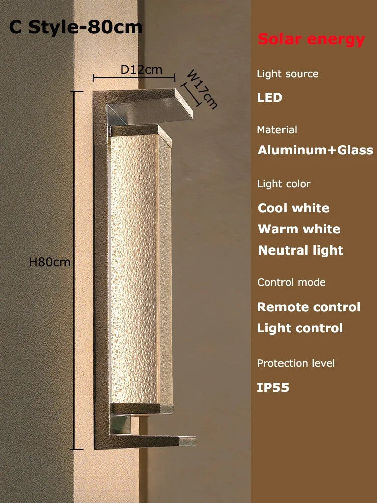 Solar dusk to dawn wall lantern glowing at night