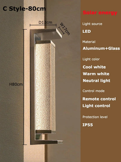 Solar dusk to dawn wall lantern glowing at night