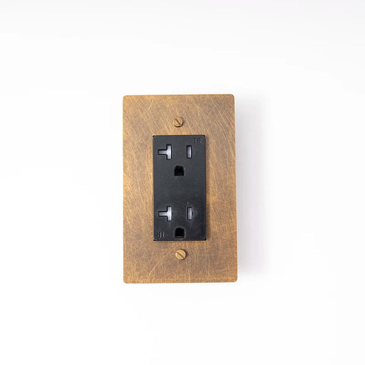 20A multi-finish wall outlet — Retro Black brass panel, standard socket | Casa Norex