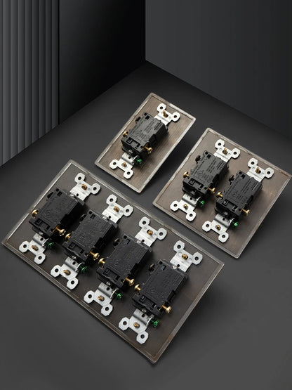 Hammered brass toggle switch panel finish close-up — Casa Norex
