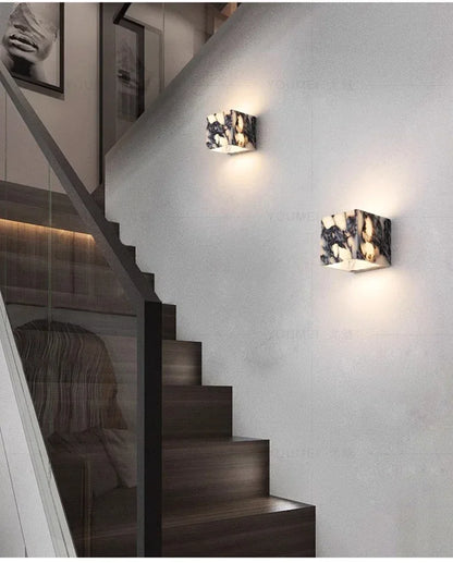 Marble wall sconce side angle view — stone body detail | Casa Norex