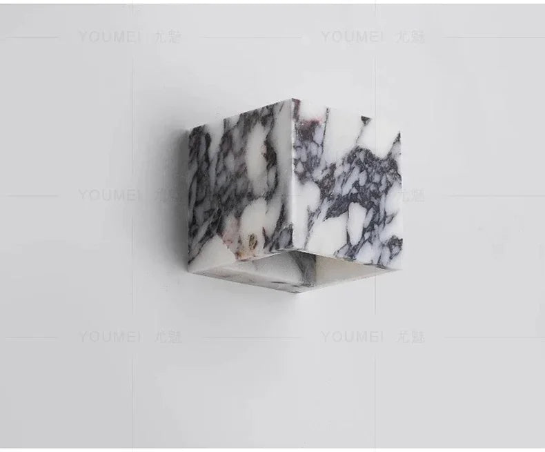 Square marble wall sconce illuminated neutral white | Casa Norex