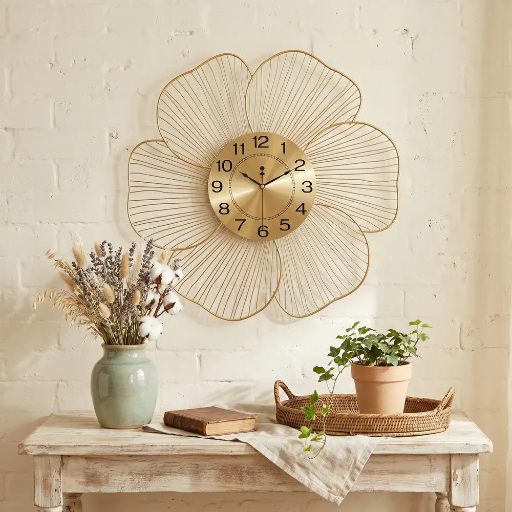 Close-up of rust-resistant metal cut into flower silhouette detail on metal flower wall clock | Casa Norex