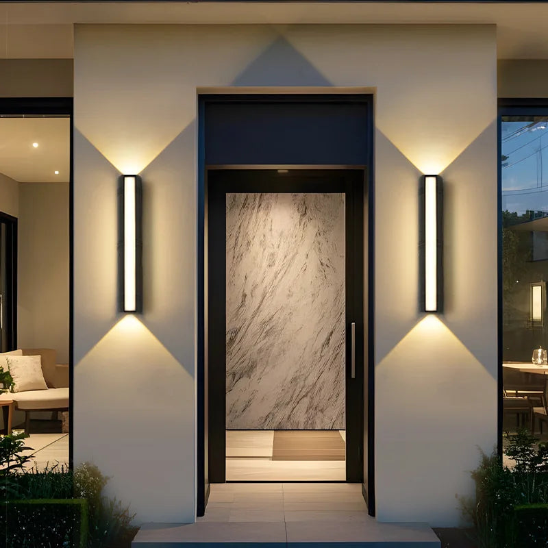 Outdoor wall light in porch setting — warm white LED glow | Casa Norex