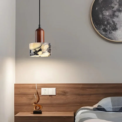 Round marble pendant light stone and wood detail from below | Casa Norex