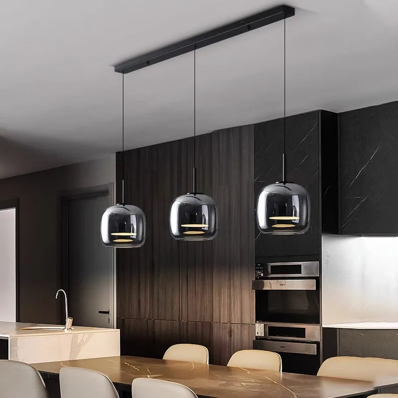 Halden Glass Cluster Pendant in dining room setting — adjustable height cord | Casa Norex