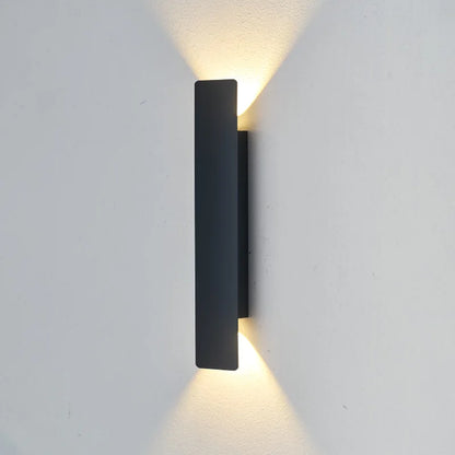 Up-down wall sconce in outdoor patio setting — waterproof IP65 design | Casa Norex