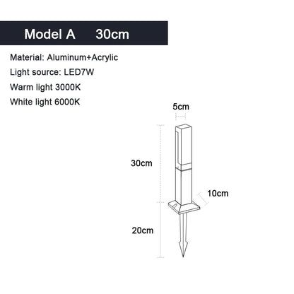 Aluminum LED lawn lamp glowing warm white at night