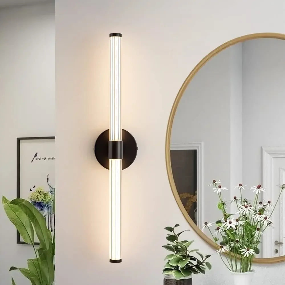 Tinsley LED wall sconce in bedroom - flexible orientation - Casa Norex