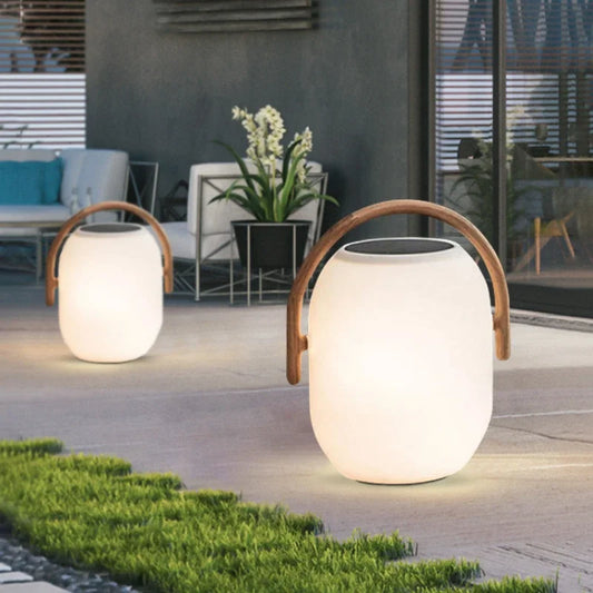 Portable solar lantern — dusk-to-dawn LED with wood and PC housing | Casa Norex