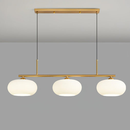 Pendant light in dining room setting — warm globe glow | Casa Norex