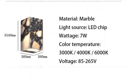 Marble wall sconce switched off — natural stone finish | Casa Norex