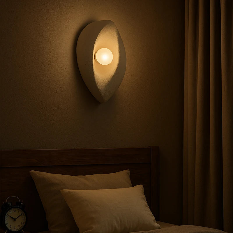 Swing-arm wall sconce in bedroom setting — bedside reading light | Casa Norex