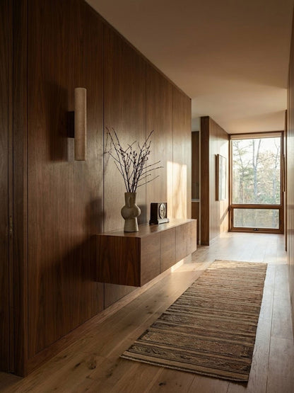 Travertine wall lamp illuminated glow — Casa Norex