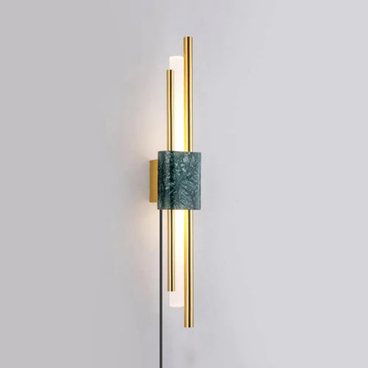 Natural marble column and twin gold rods close-up - Tanto lamp by Casa Norex