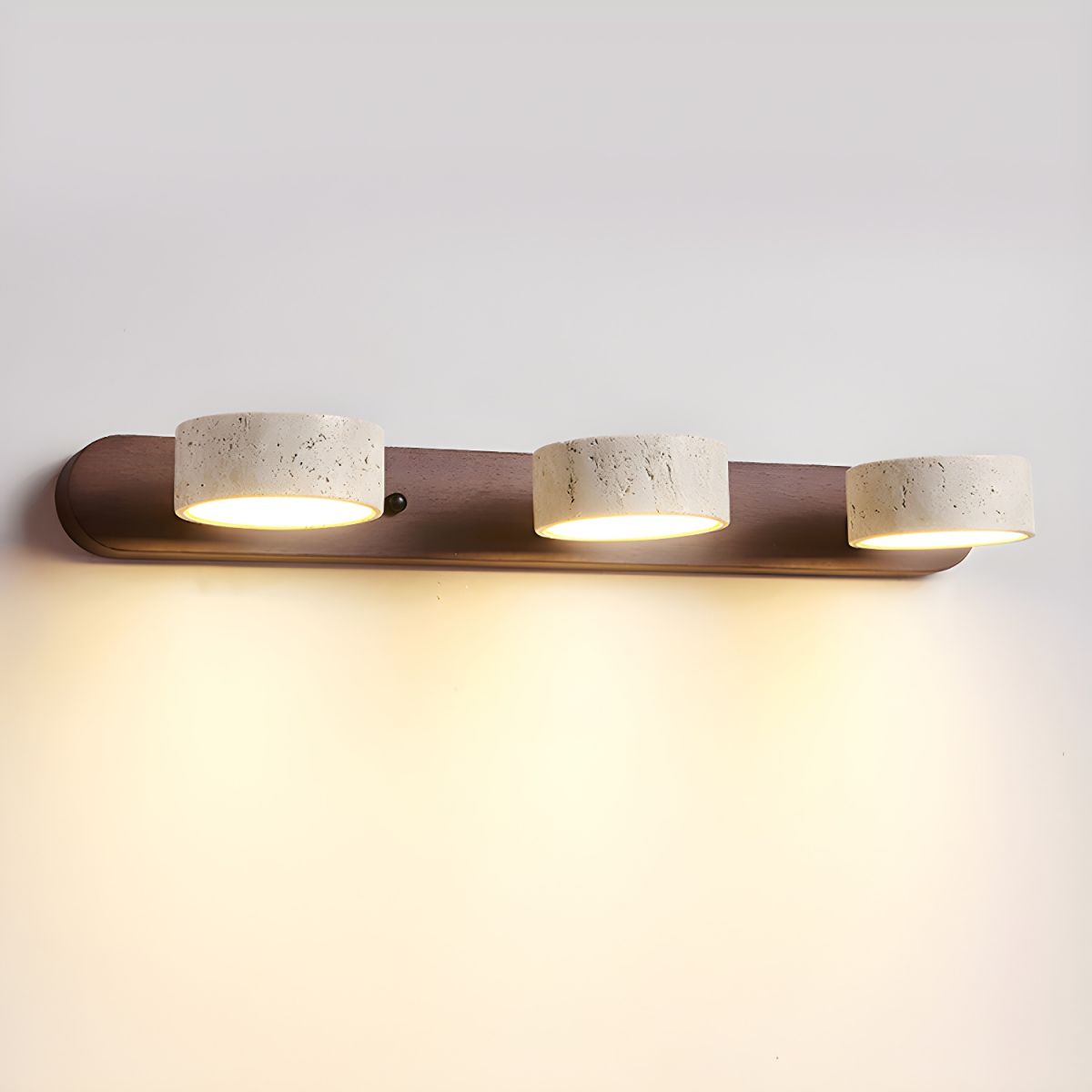 Close-up of travertine stone texture on wall light | Casa Norex