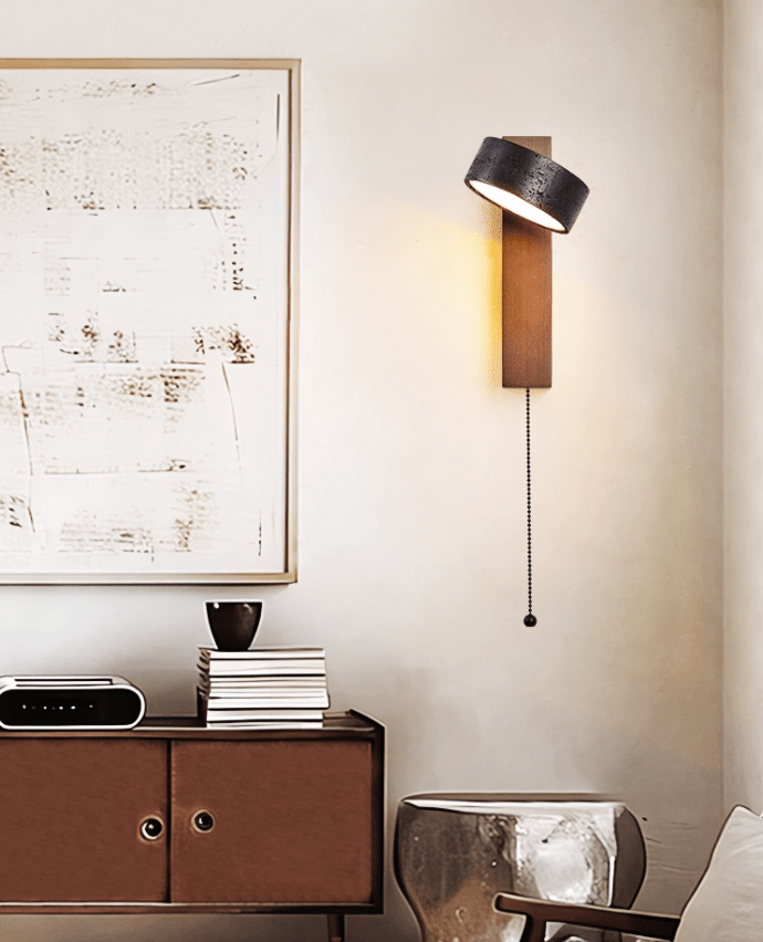 Wall sconce in modern living room setting — warm LED glow | Casa Norex