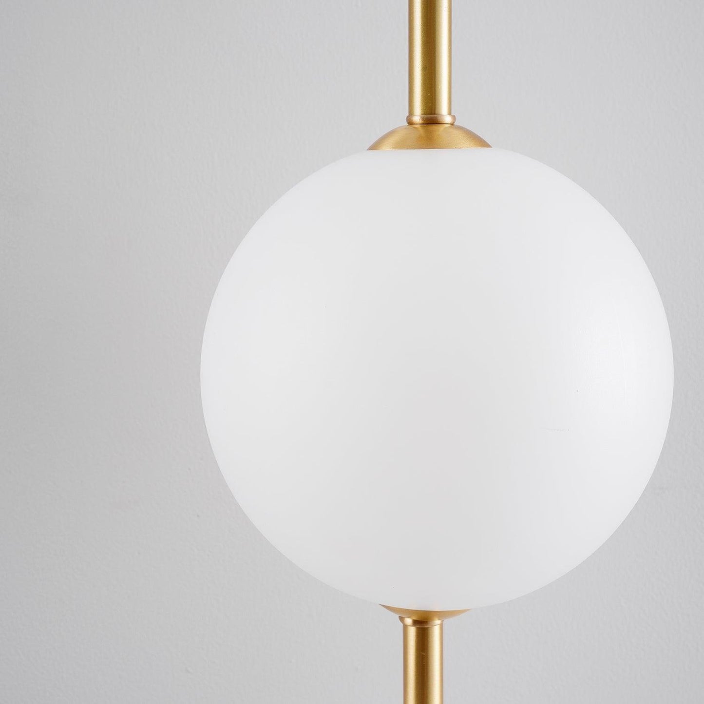Vertical Globe wall lamp installed hallway bathroom - Casa Norex