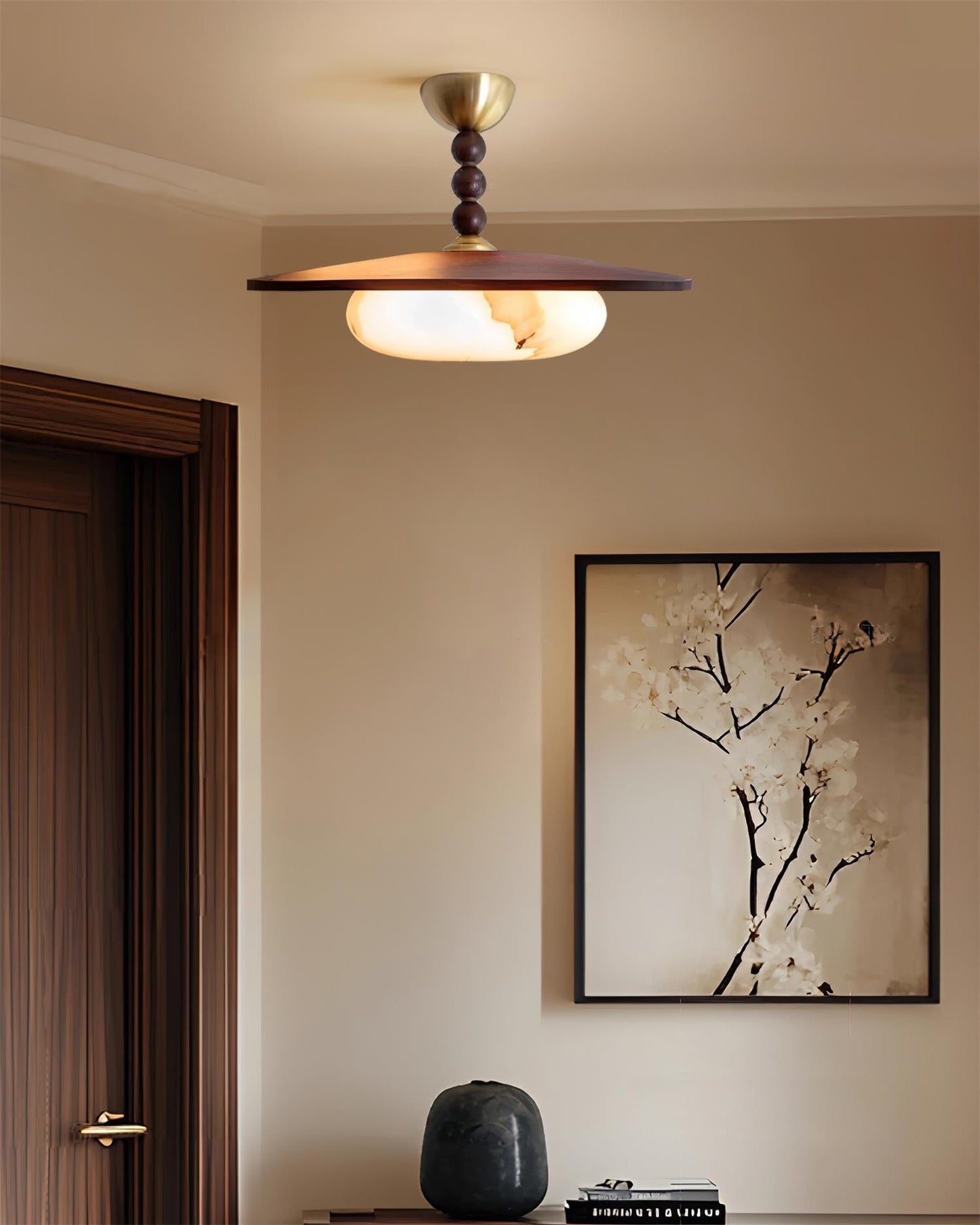 Wood and brass ceiling fixture detail — Casa Norex