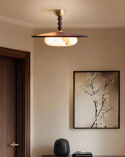 Wood and brass ceiling fixture detail — Casa Norex