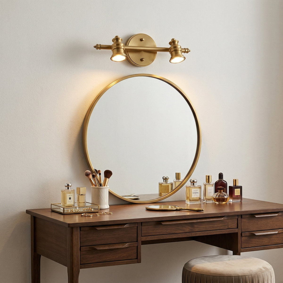 Brass spotlight bar above a round mirror on a wooden dressing table — Casa Norex
