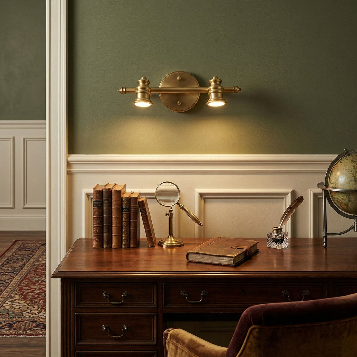 Brass spotlight bar lighting a wooden desk against a green panelled wall — Casa Norex
