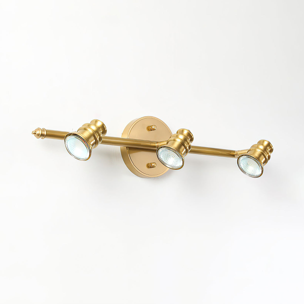 Two-head brass spotlight bar with both heads lit — Casa Norex