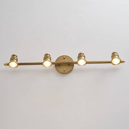 Macro view of the brass bar and mounting point of a spotlight head — Casa Norex