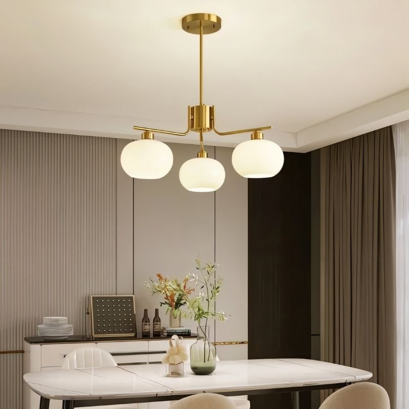 Chandelier in dining room setting — round 3-light configuration | Casa Norex