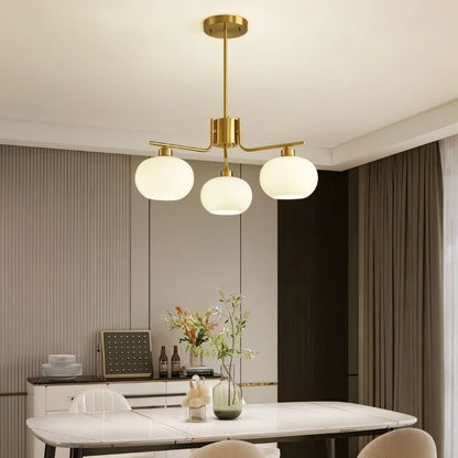 Chandelier in dining room setting — round 3-light configuration | Casa Norex