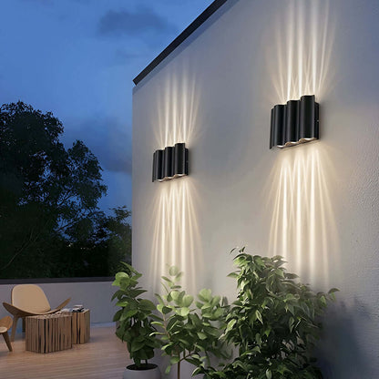 Close-up of wavy aluminum body on beam wall light | Casa Norex