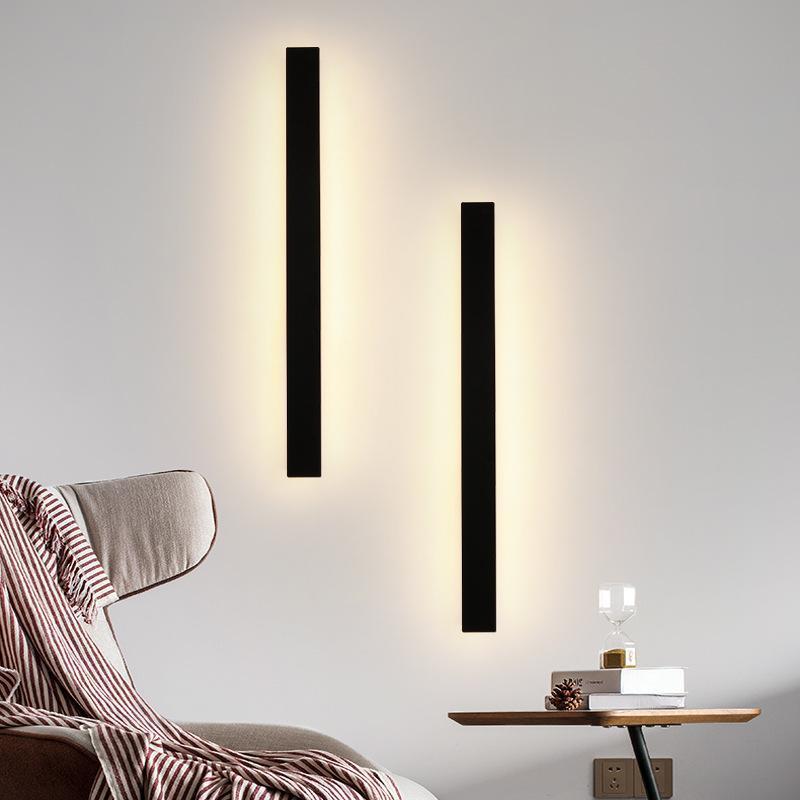 Long linear outdoor wall light close-up of sleek black frame — Casa Norex