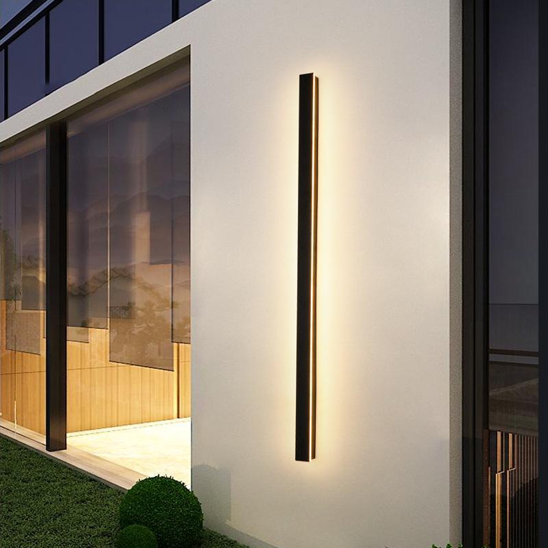 Long linear outdoor wall light on stylish patio with soft linear light — Casa Norex