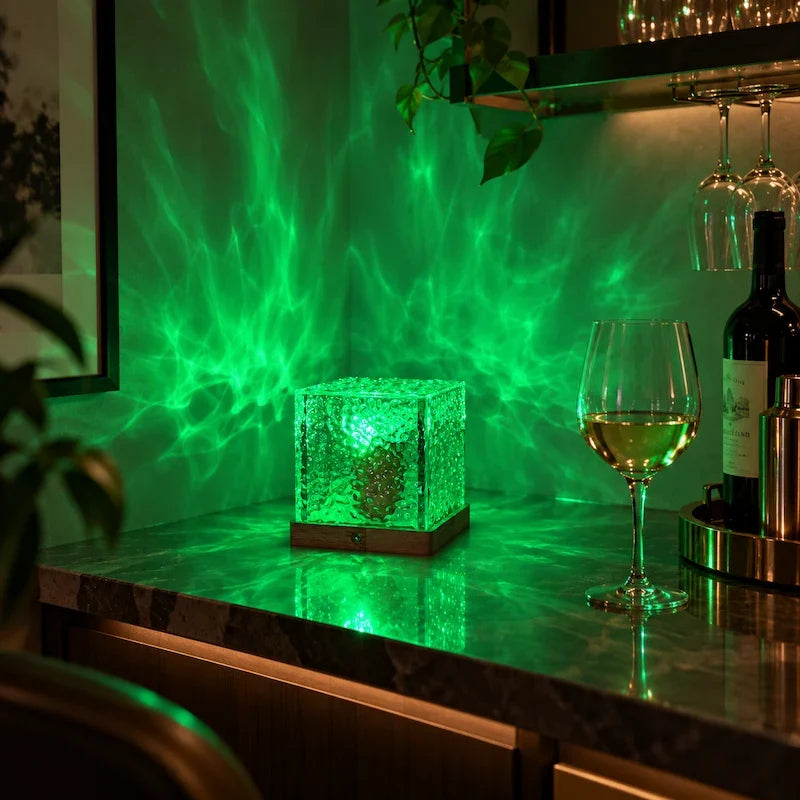 Green aurora light patterns cast on a wall by a northern lights cube lamp — Casa Norex