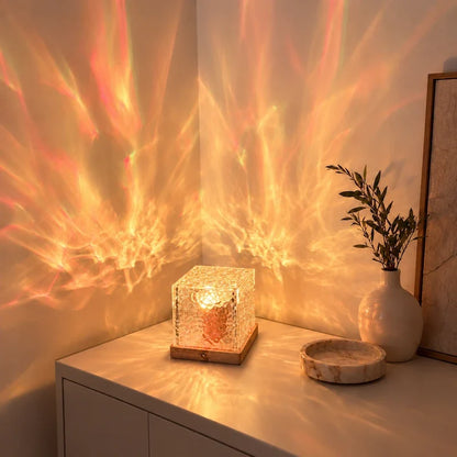 Peach and orange aurora light effect on a wall from a northern lights cube lamp — Casa Norex