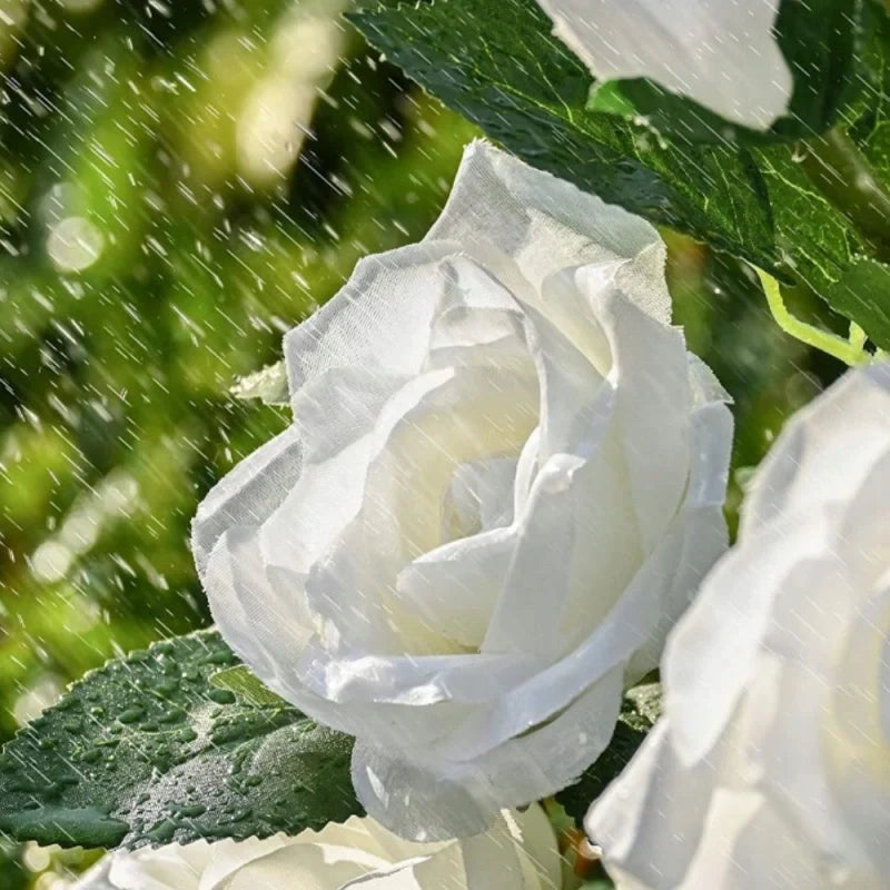 Close-up of a white faux rose bloom on a stake light — Casa Norex