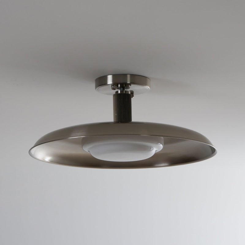Flush mount ceiling light setting — polished nickel dish on a grey backdrop | Casa Norex