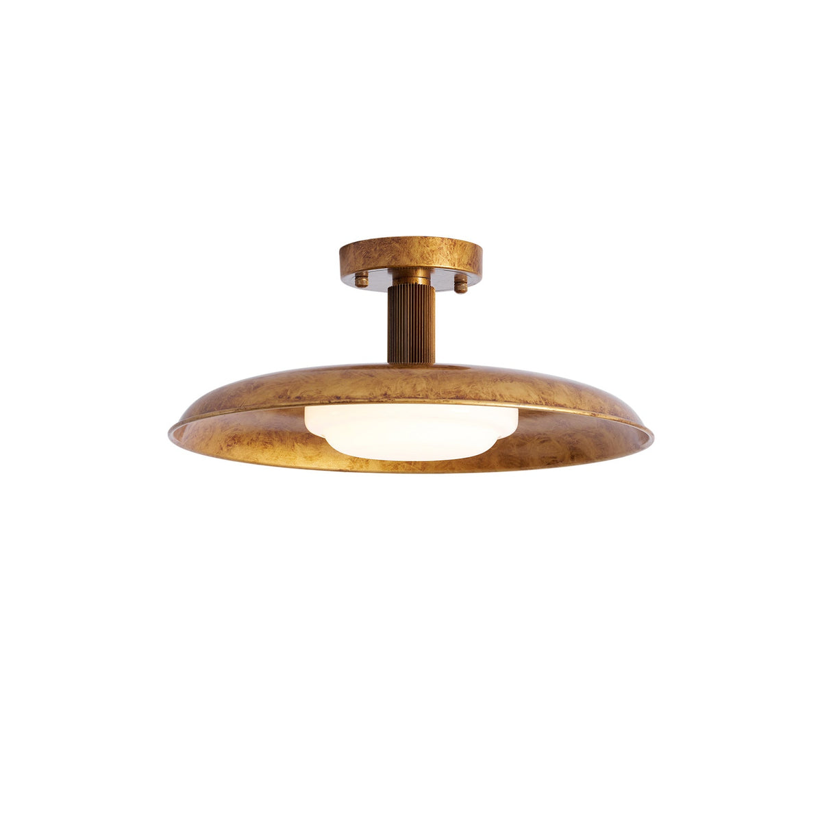 Close-up of the frosted glass diffuser on a gilded iron ceiling light | Casa Norex
