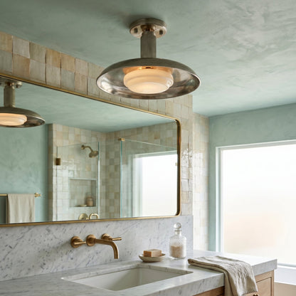 Polished nickel ceiling light in a bathroom with a large mirror — Casa Norex